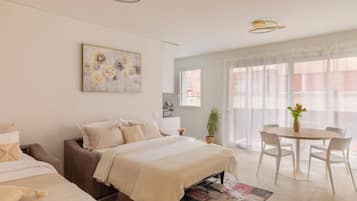 1 bedroom, desk, iron/ironing board, travel crib