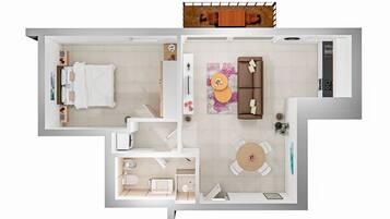 Ein Grundriss eines Hotelzimmers mit Bett, Sofa, Esstisch, Küchenzeile und Badezimmer.