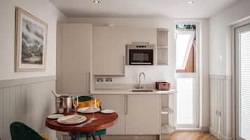 Fridge, microwave, toaster, cookware/dishes/utensils