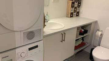 Hair dryer, towels, soap, shampoo