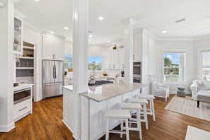 Full-sized fridge, microwave, oven, stovetop - Stunning Lakefront Escape Steps to Beach w/ Pool, Spa, & Gulf-View Rooftop Deck (Seagrove Beach)