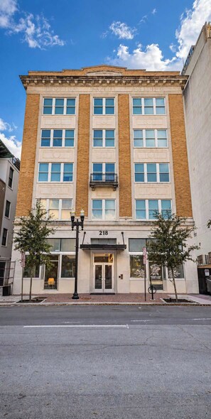 A multi-story building with a sign reading 'Florida Baptist Building' at the top.