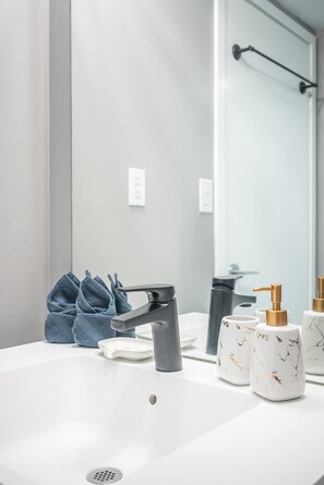 Hair dryer, towels, soap, shampoo