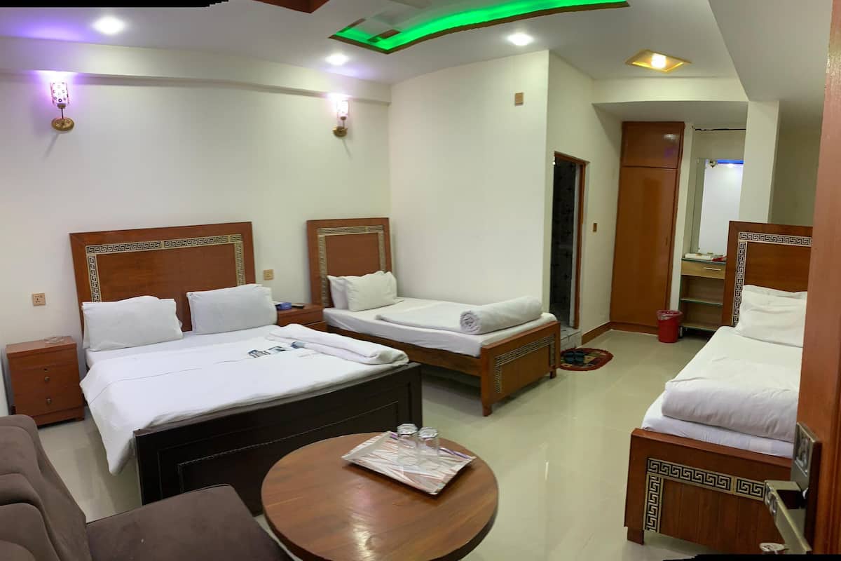 Deluxe Quadruple Room, 4 Bedrooms | Desk, free WiFi
