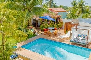 Outdoor pool, pool umbrellas, sun loungers