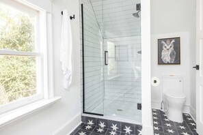 Bathtub, hair dryer, towels