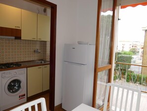 Fridge, microwave, toaster, cookware/dishes/utensils