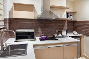 Mini-fridge, microwave, stovetop, dishwasher