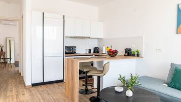 Deluxe Apartment | Living area