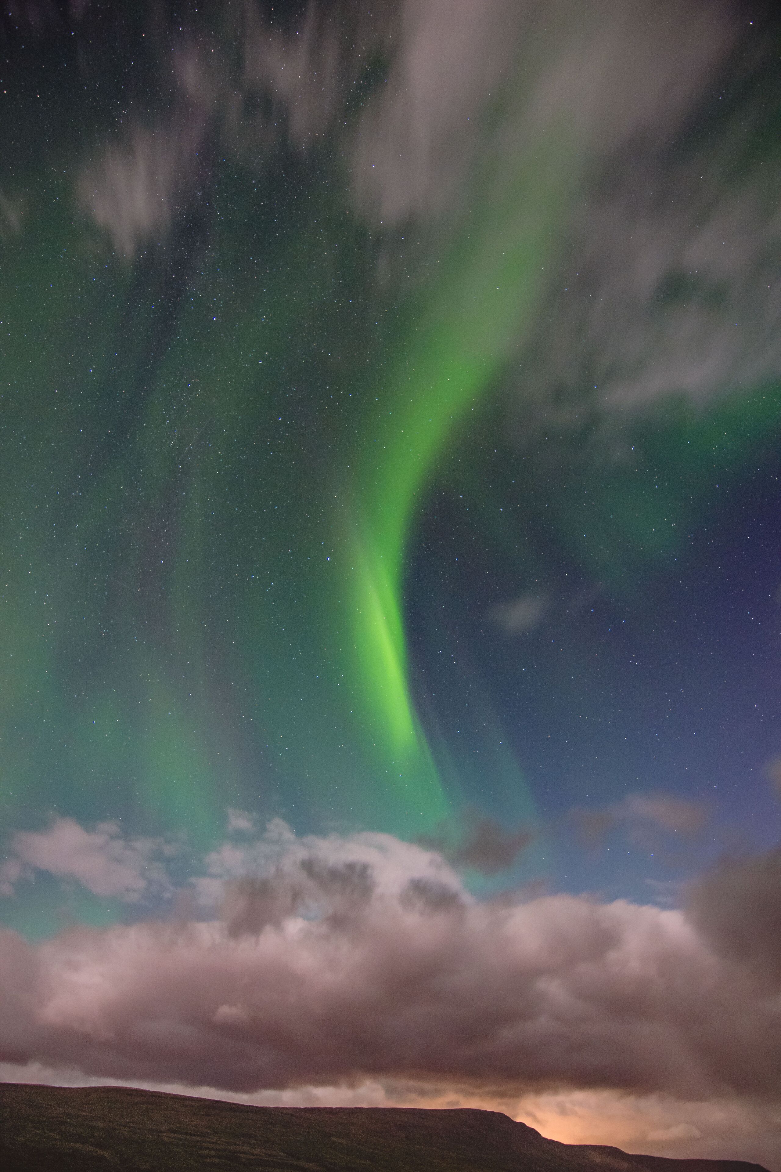 A night sky with the aurora borealis.