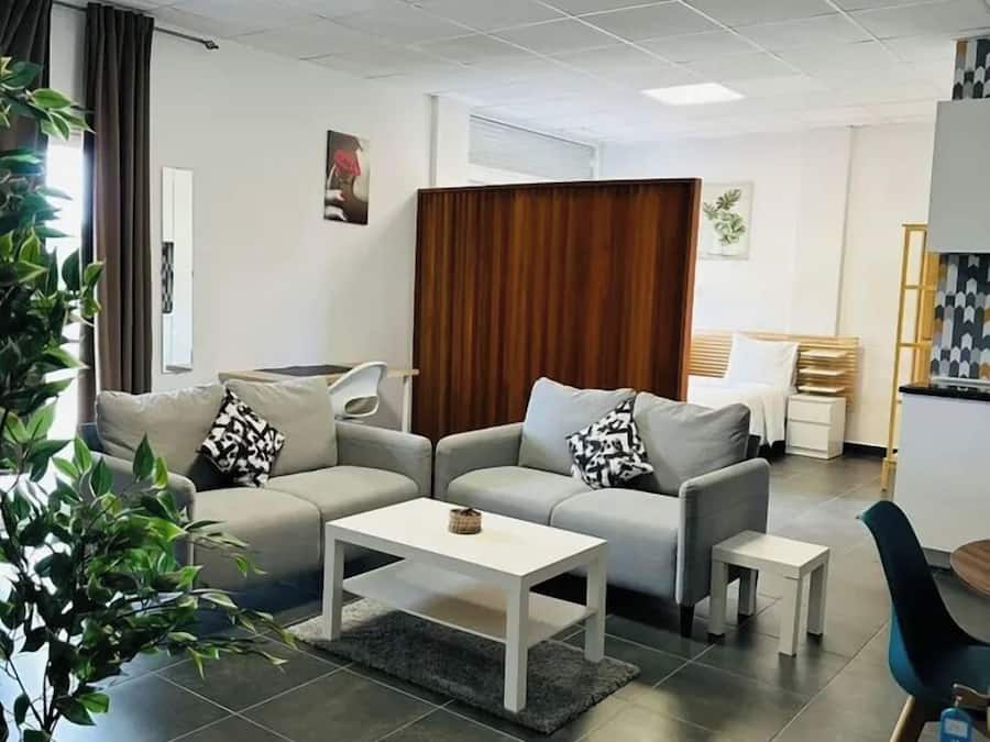 Comfort Room | Living area | 43-inch Smart TV with satellite channels