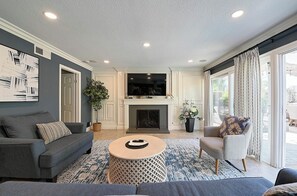 Smart TV, fireplace, video games, foosball