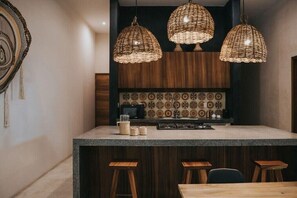 Fridge, microwave, stovetop, coffee/tea maker