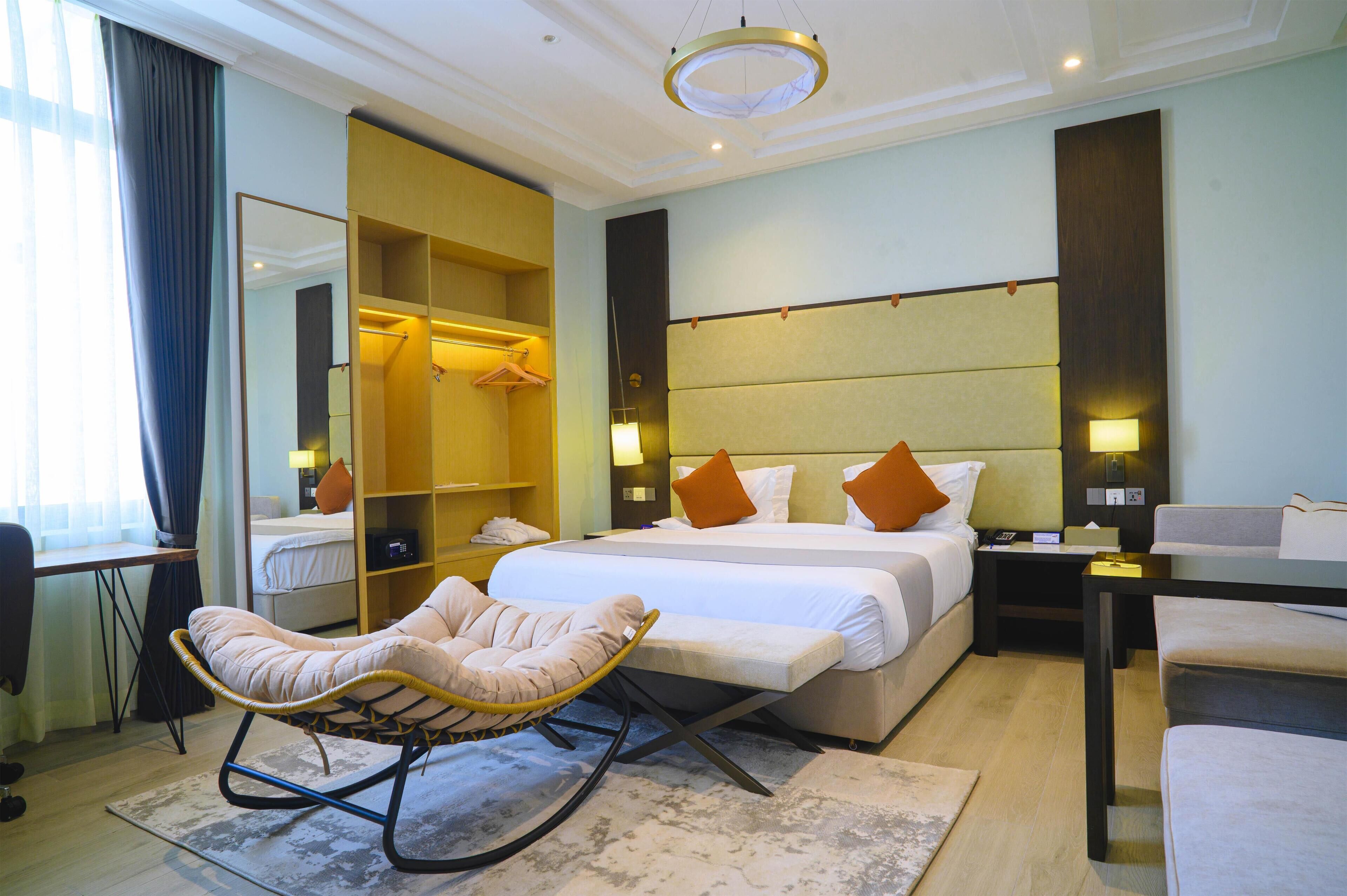 Suite, 1 King Bed, Non Smoking (Living Room;Presidential) | In-room safe, desk, soundproofing, iron/ironing board
