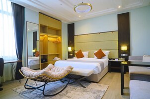 Suite, 1 King Bed, Non Smoking (Living Room;Presidential) | In-room safe, desk, soundproofing, iron/ironing board