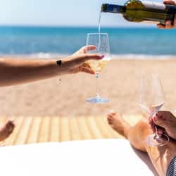 On the beach, sun loungers, beach umbrellas, beach towels