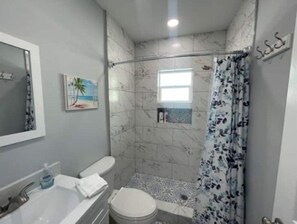Hair dryer, towels, soap, shampoo