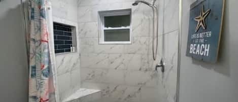 Hair dryer, towels, soap, shampoo