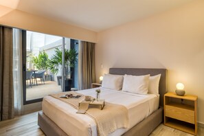 Two-Bedroom Apartment with Huge Private Patio | Premium bedding, down duvets, in-room safe, individually decorated