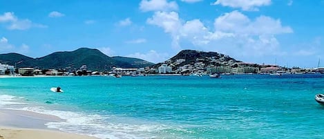 On the beach, sun-loungers, beach towels