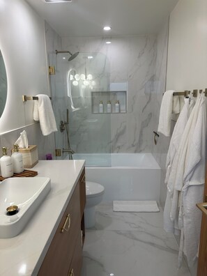 Shower, towels, soap, shampoo