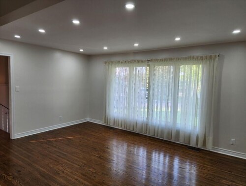 An Executive Side-Split Brick & Stone Home on a Large Corner Lot in Trenton.