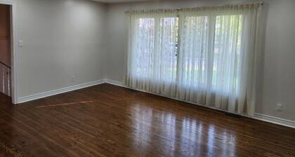 An Executive Side-Split Brick & Stone Home on a Large Corner Lot in Trenton.