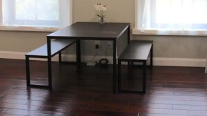 A room with a dark wood floor, a central table with benches, two windows with white curtains, and a round mirror on the wall. - ★MODERN 1BR GREAT Location Downtown! W/D Parking!★ (Albany)