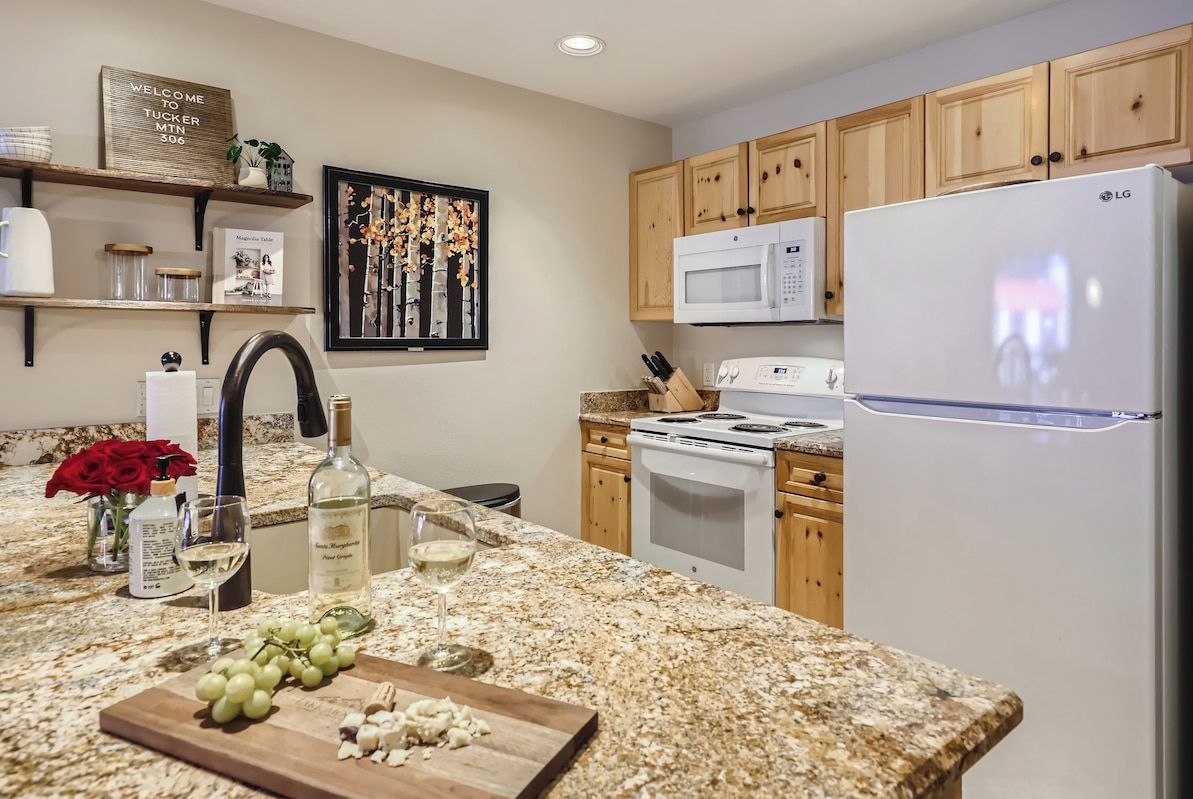 Kitchen has ample storage, along with a huge walk-in pantry.  Oversized Island with granite counter tops.  