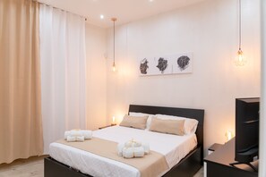 2 habitaciones, tabla de planchar con plancha, wifi y ropa de cama 