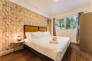 Appartement, patio | 1 chambre, bureau, rideaux d’obscurcissement, fer et planche à repasser