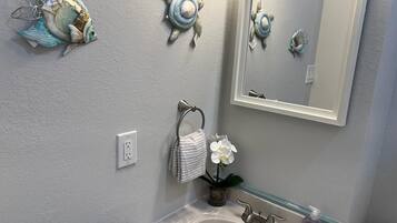 Hair dryer, towels, soap, shampoo