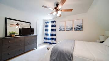 2 habitaciones y tabla de planchar con plancha