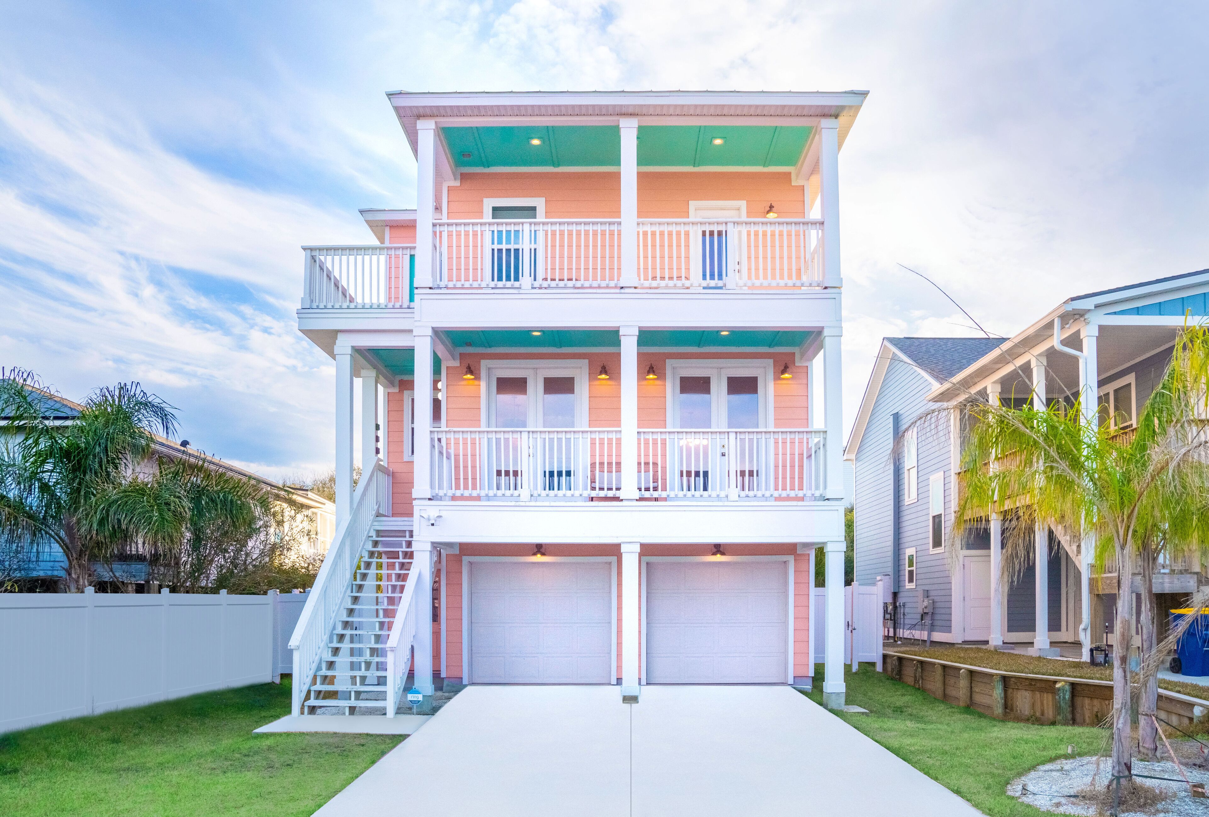 Three story peachy beach house. Steps to the ocean. New custom