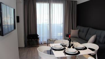 Appartement, 1 chambre | Coin séjour