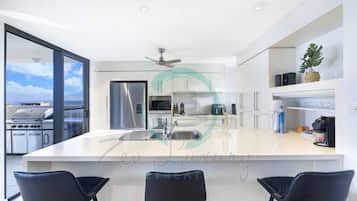 Luxury Condo | Private kitchen | Fridge, microwave, oven, stovetop