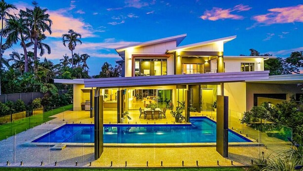 A modern two-story house with a swimming pool, large windows, and a well-maintained garden. - ZENLUX - 5BR Holiday Home with Pool (Fannie Bay)