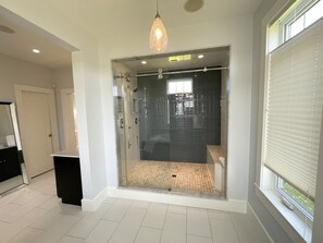 Jetted tub, hair dryer, towels, toilet paper