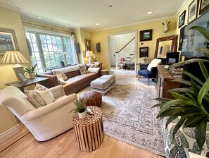 TV, fireplace, books, stereo