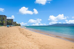On the beach, sun-loungers, beach towels
