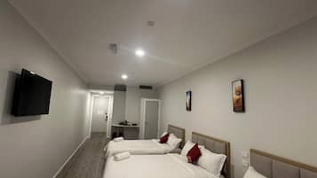 Premium bedding, down duvets, in-room safe, individually decorated