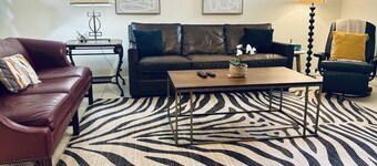 Magnolias on Cobblestone – Stylish Pet Friendly Retreat w/ Private Lanai, Pool Access & Smart TVs!