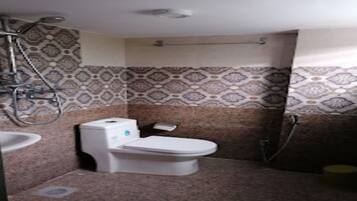 Shower, rainfall showerhead, towels, soap