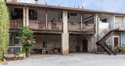 Appartement de vacances "Cascina Raperonzolo" avec terrasse privée, climatisation et Wi-Fi