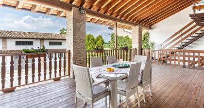 Appartement de vacances "Cascina Raperonzolo" avec terrasse privée, climatisation et Wi-Fi
