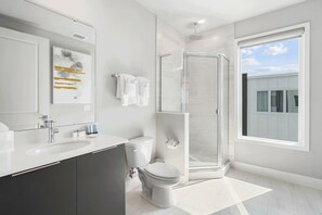 Shower, hair dryer, towels, soap