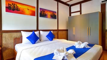 Minibar, meja kerja, Wi-Fi gratis, dan seprai linen