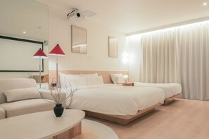 A modern hotel room with a large bed, a bedside table, a red lamp, a mirror, and a window with curtains. - Anook Hotel Cheongju Ⅰ (Cheongju)