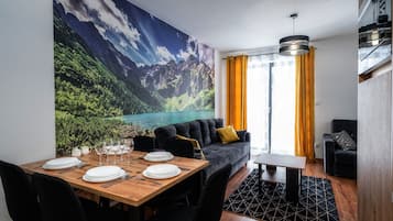 Apartment (G7) | Living area | Flat-screen TV