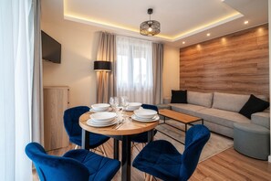 Apartment (G5) | Living area | Flat-screen TV - Sun & Snow Resorts G Białka Tatrzanska (Bukowina Tatrzanska)